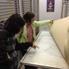 Looking at Olmsted Brothers plans with Michelle Clark